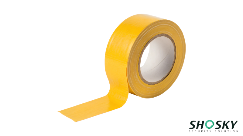 a yellow adhesive tape roll