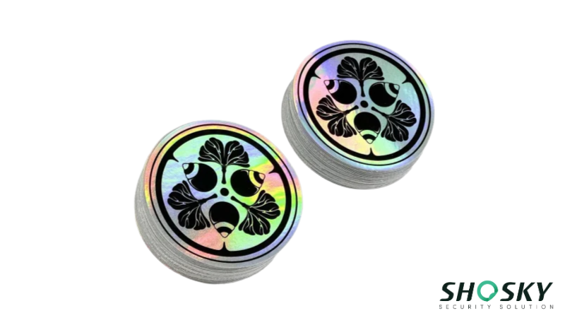 two piles of UV Printed hologram stickers