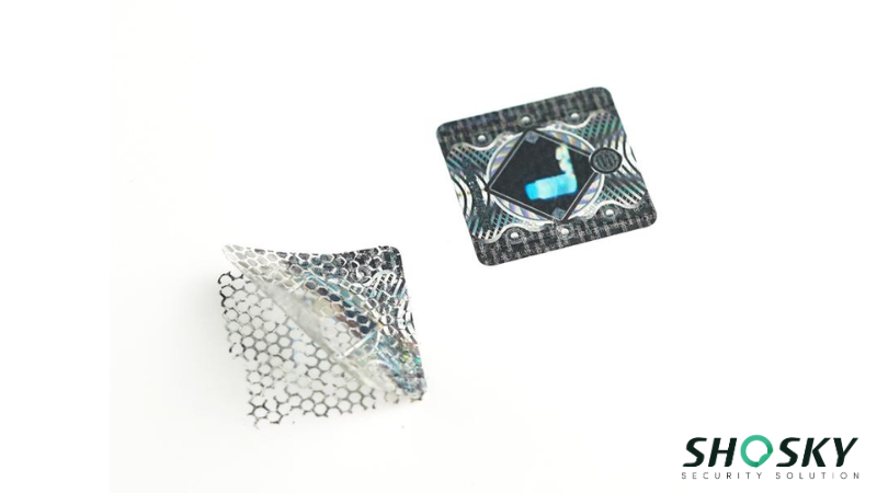 A hologram sticker before and after peeling