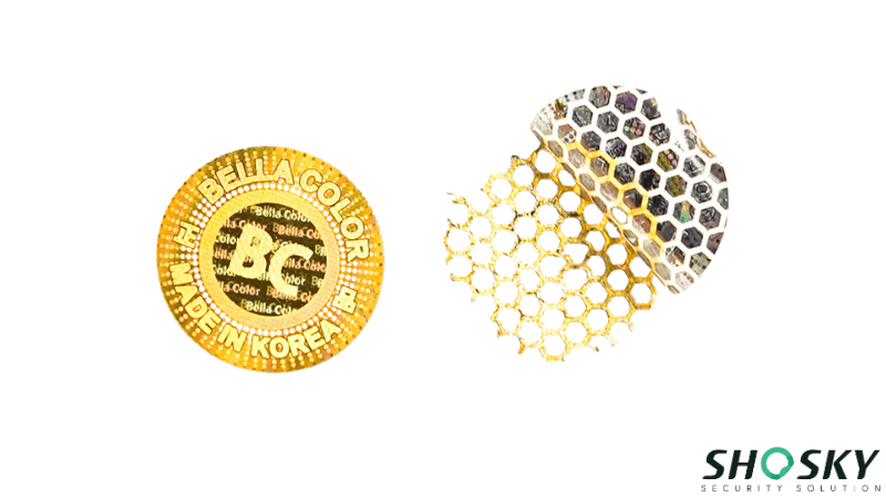 hologram sticker and the honeycomb-like adhesive marks left after tearing