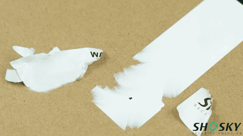 shosky security's ultra-destructible label showing on cardboard