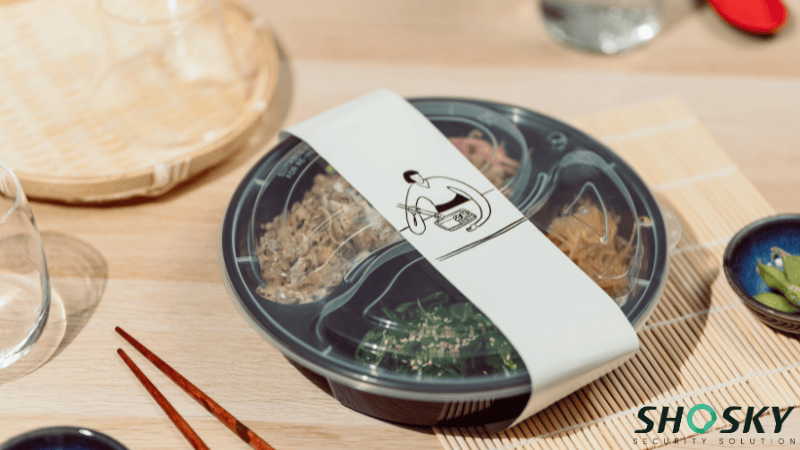 take out packaging with security sleeve