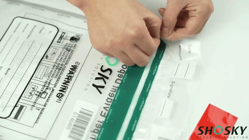 Tamper evident bag from Shosky security with form sections for date, amount, and signature