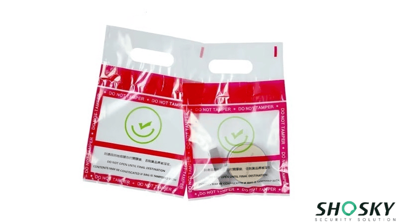 Two tamper-evident duty-free bags with 'DO NOT TAMPER' text