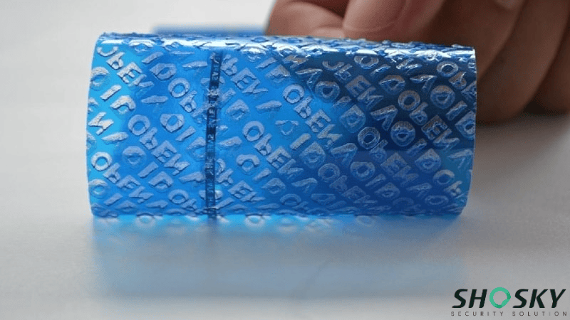 Close-up of non-transfer security tape's tamper-evident design