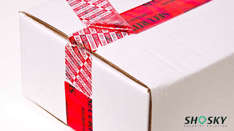 White box sealed with red tape showing tamper-evident 'VOID' markings