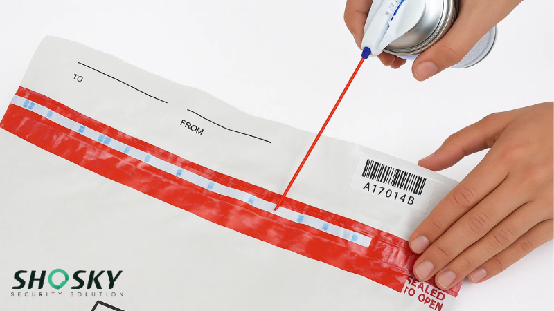 Custom-printed security bag with a visible barcode, logo, and tamper-evident tape being sealed