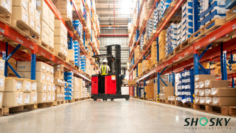 a man's checking warehouse security