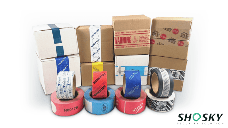 Close-up of tamper-evident tapes and on boxes, emphasizing the visible security measures
