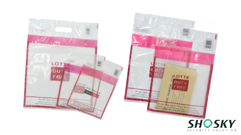 Airport-ready duty-free bags combining bold logos and regulatory seals for brand exposure