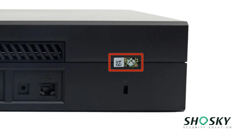 Tampered warranty label exposing 'VOID' text to prevent unauthorized repairs