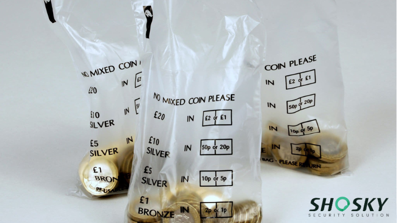 Transparent deposit bags sorted by coin type for small business banking