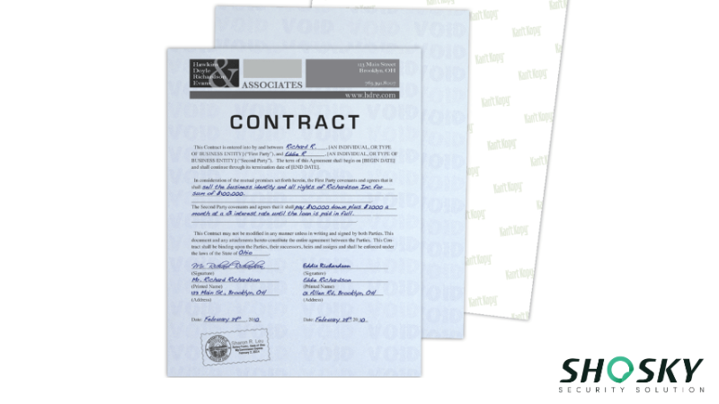 Close-up of a contract printed on anti-copy security paper with a visible watermark