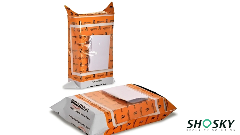 Orange e-commerce parcels labeled and sealed, linking retail branding with security