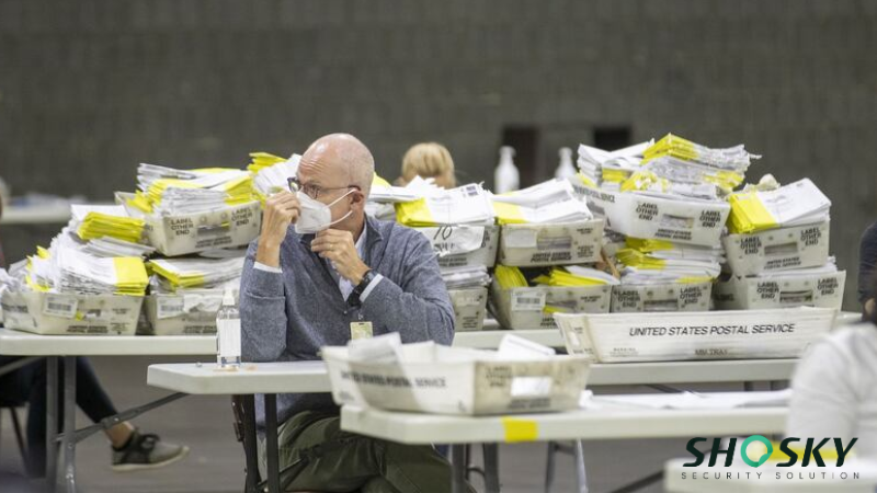 Georgia election recount setup with verified paper ballots and sorting trays