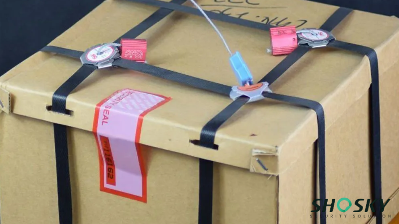 Box sealed with security tape and straps reinforces access visibility and control