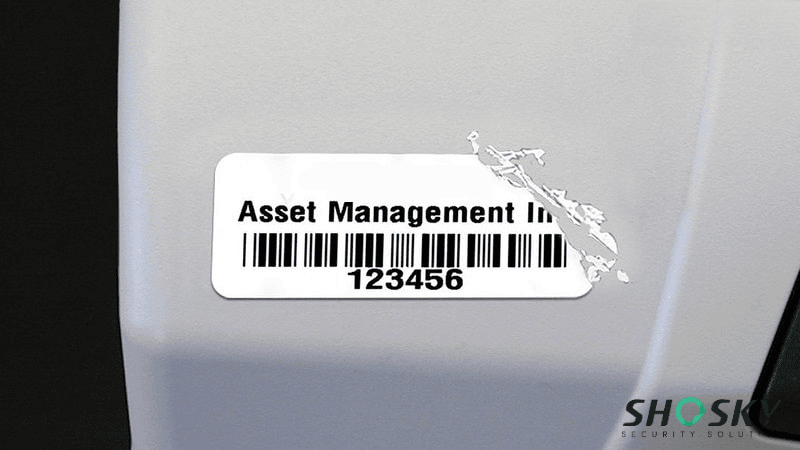 Barcode sticker fails to adhere properly on light gray plastic container