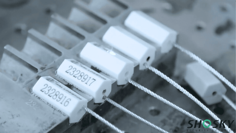 white cable security seals placed inside a mold in the factory
