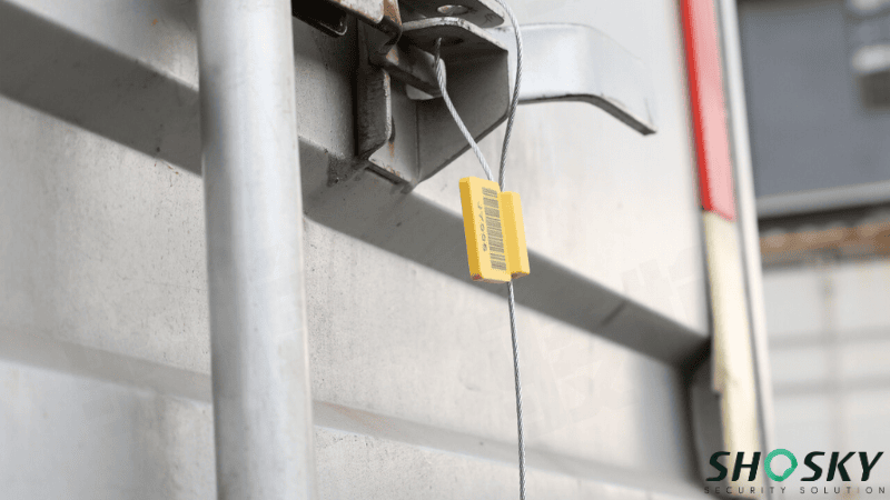 Heavy duty braided cable seal applied to door of a cargo truck