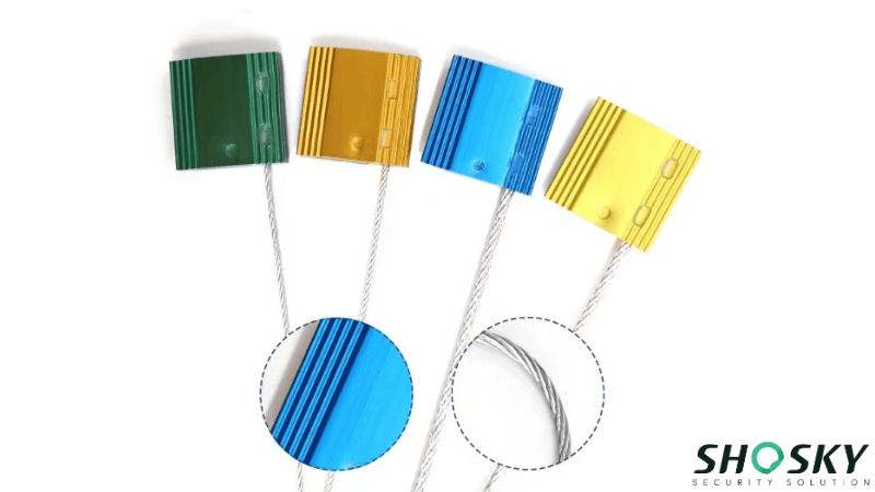 Tamper-evident cable security seals with an aluminum body and wire, showing detailed zoomed-in views
