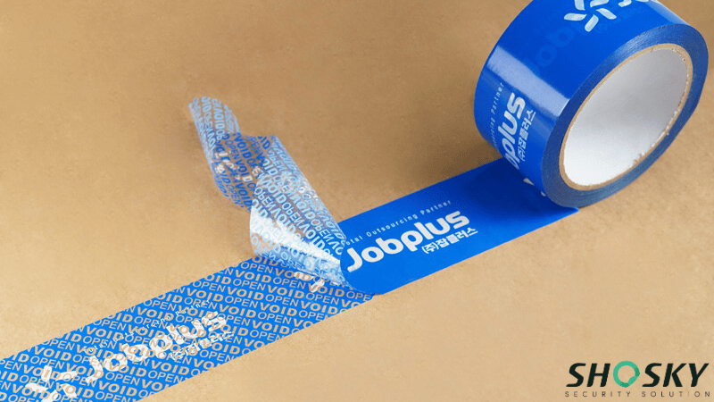 Custom branded blue void tape on a box revealing a "VOID OPEN" hidden message when peeled.