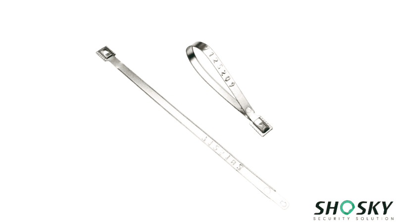 Two silver metal strap seals on a white background, showing one flat unfastened strap and one looped closed strap