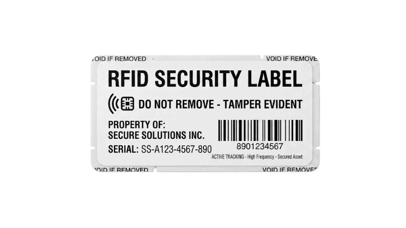 A white RFID label printed with "RFID SECURITY LABEL", a barcode, serial number, and "VOID IF REMOVED" tamper-evident warnings.