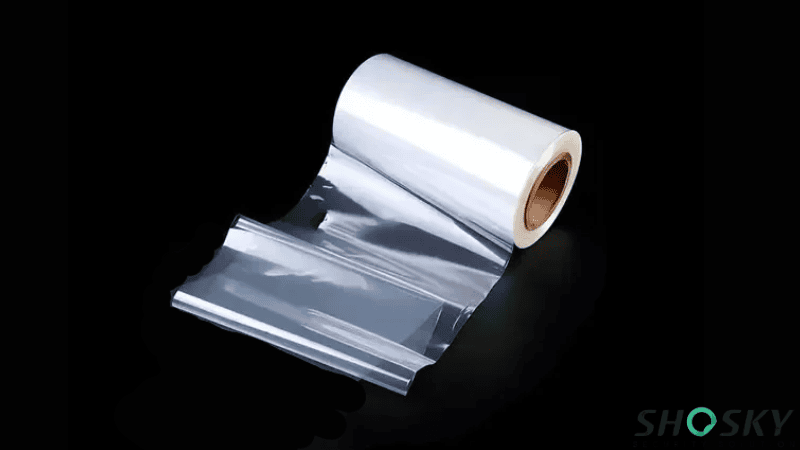 Roll of clear co-extruded film material for tamper-evident security label
manufacturing