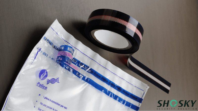 a security bag sealing tape roll and a sealed security bag